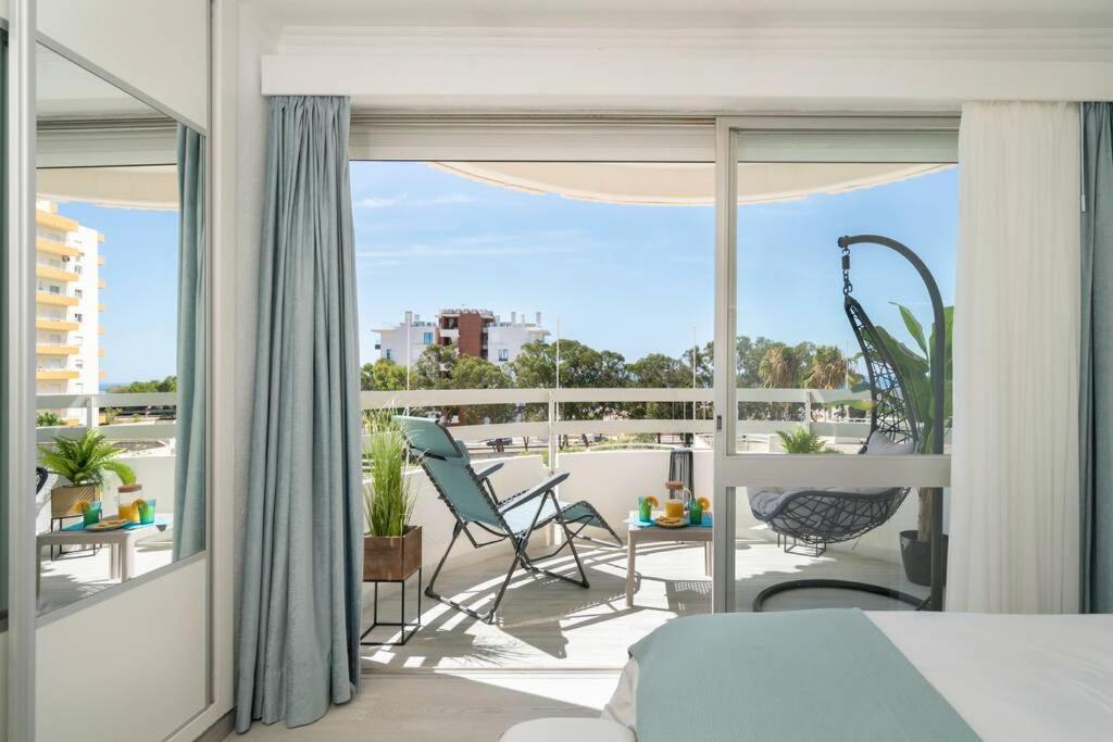 Front Beach Apartment Портиман Экстерьер фото