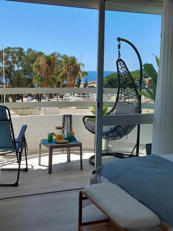 Front Beach Apartment Портиман Экстерьер фото